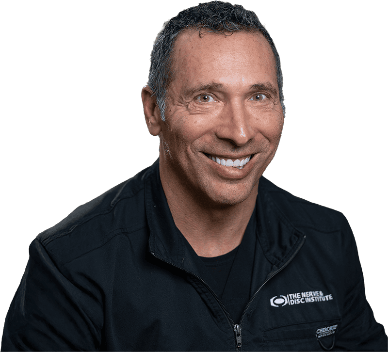 Nerve & Disc Institute doctor performing spinal assessment.